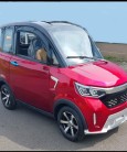 Elektrické auto pro tři osoby. Miky.